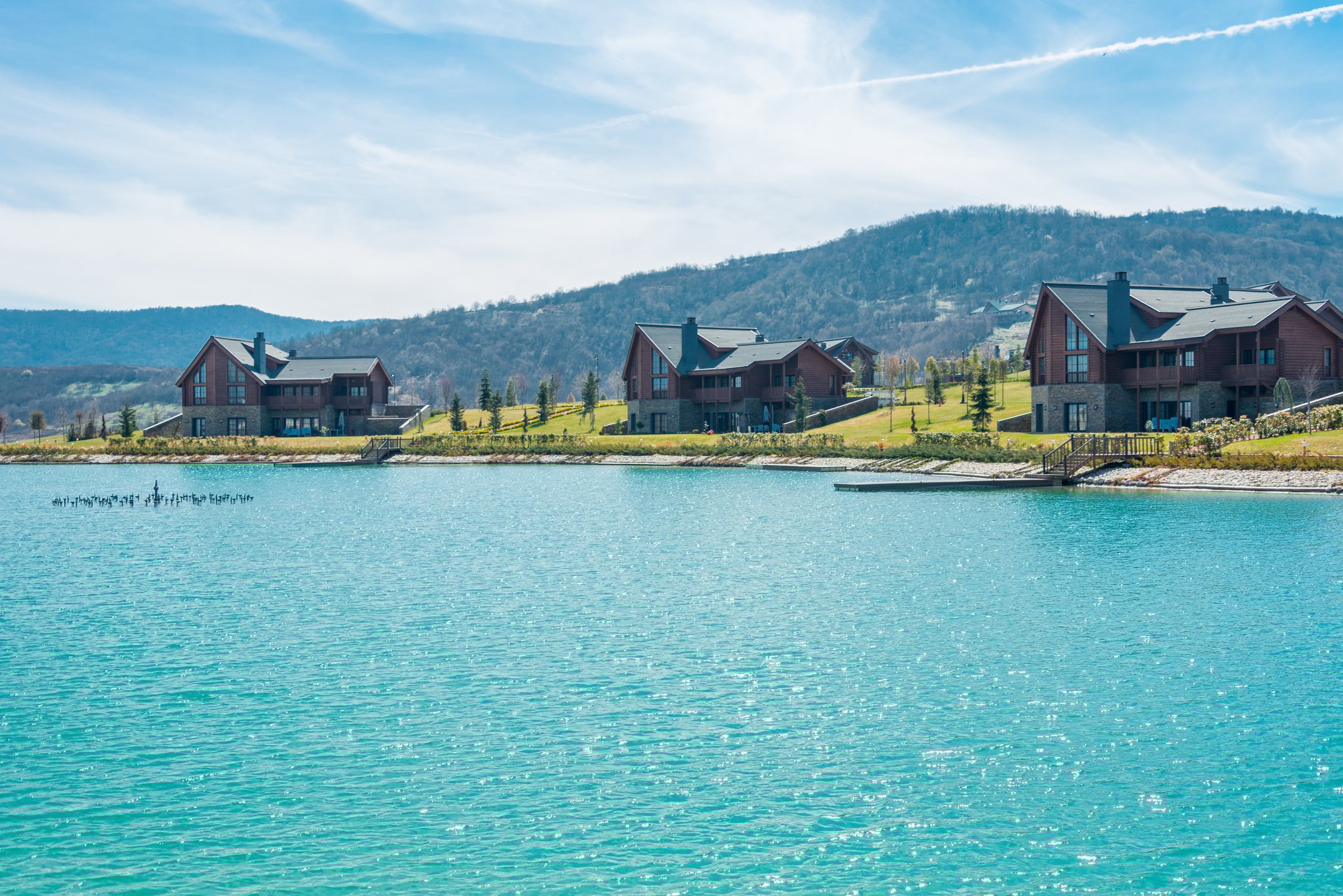 Modern House near Water on Bright Day
